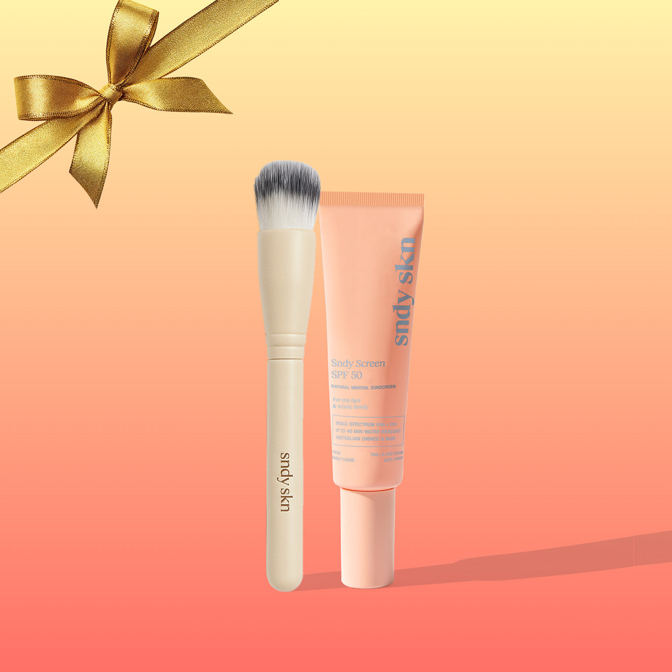 SNDY SKN Face tinted SPF 50 and brush set. Clean and natural sunscreen